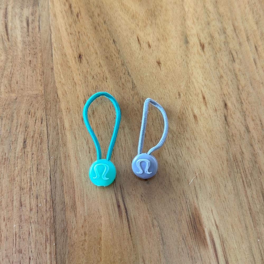 Lululemon zipper pulls/hair ties